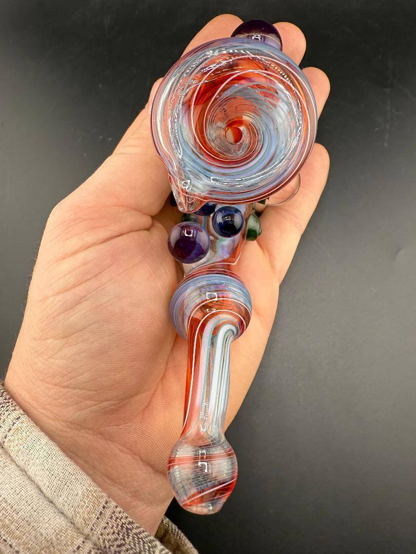 Brando Glass Sherlock Pipe - Red & Blue Wig Wag w/ Mushroom & Grateful Dead Millie Attachments held in hand.