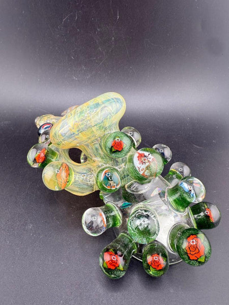 Brando Glass Side Car Pipe - Gold Fume  Liquid Filled & Floating Opals w/ 15+ Grateful Dead Millies on display.