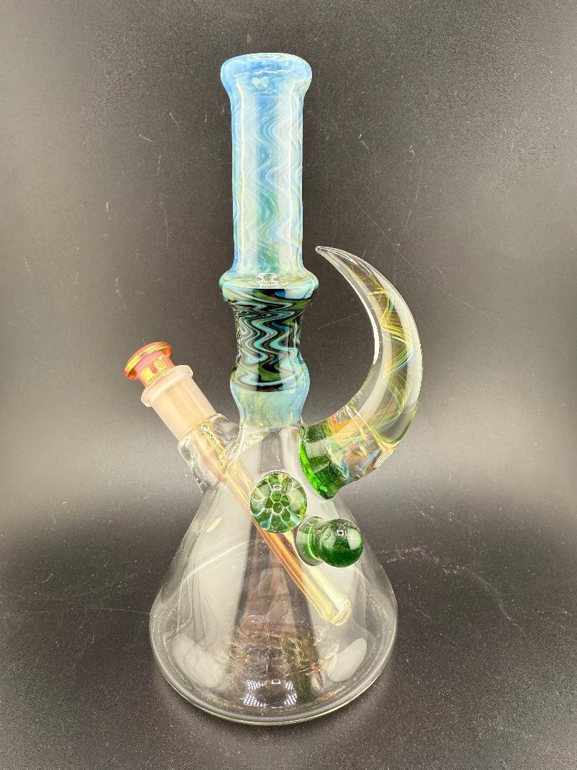 Brando Glass Wig Wag Space Tech Beaker in green and blue, 10mm, handcrafted American glass, vibrant design.