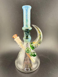 Brando Glass Wig Wag Space Tech Beaker in green and blue, 10mm, handcrafted American glass, vibrant design.