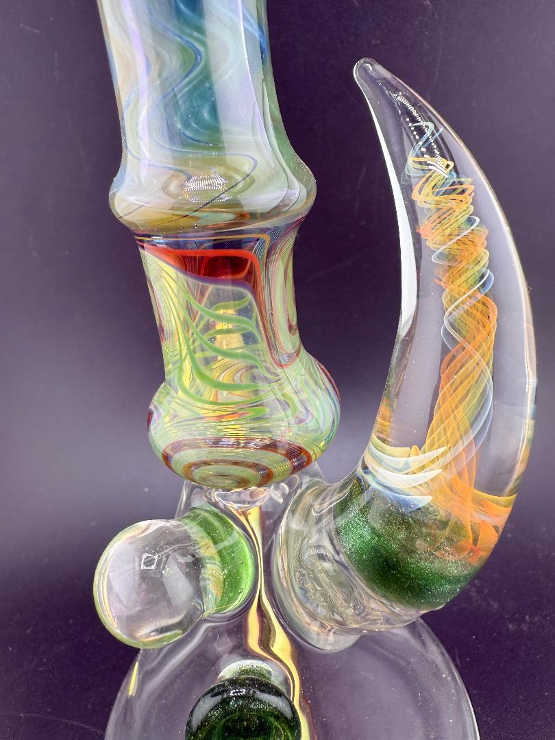 Brando Glass Wig Wag Space Tech Beaker in green and red, showcasing vibrant colors and intricate craftsmanship.