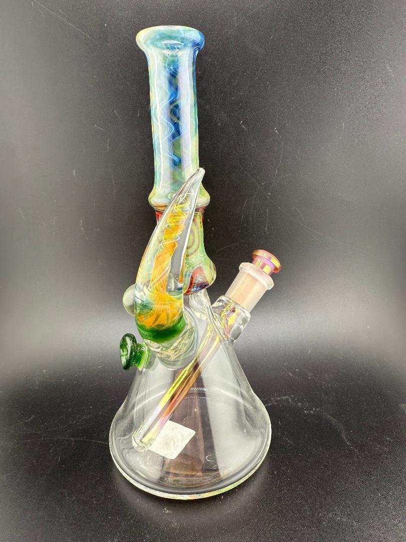 Brando Glass Wig Wag Space Tech Beaker in green and red, handcrafted American glass, highlighting vibrant wig wag design.