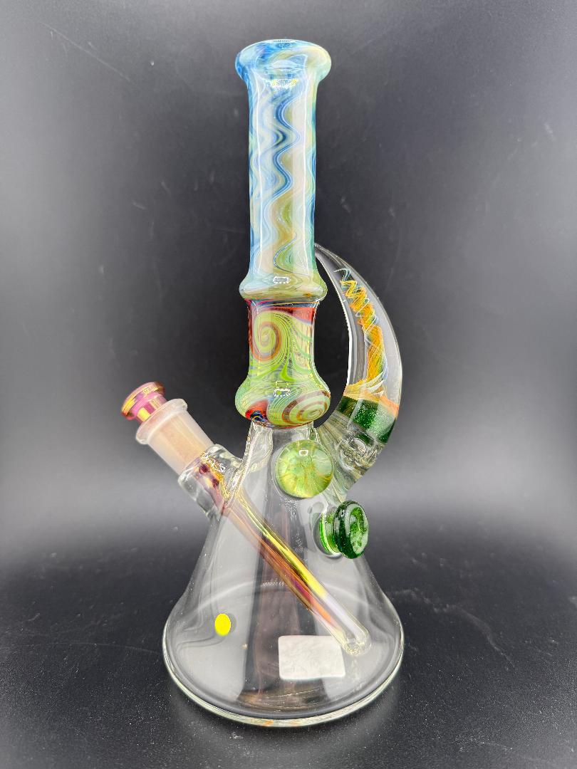 Brando Glass Wig Wag Space Tech Beaker in green and red, handcrafted American glass, showcasing dynamic wig wag design.
