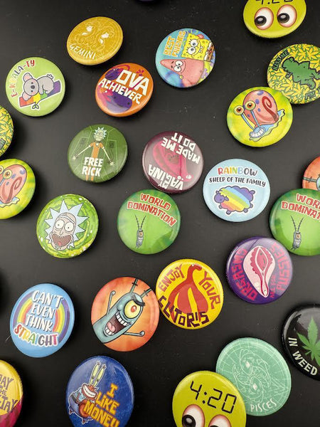 Bucket O Buttons 4pc Mystery Pack featuring various unique button designs including quotes and characters.