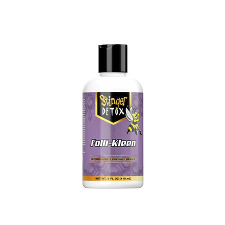 Stinger Detox FolliKleen Hair Cleanser bottle designed for deep detox of hair and scalp, featuring a natural blend.
