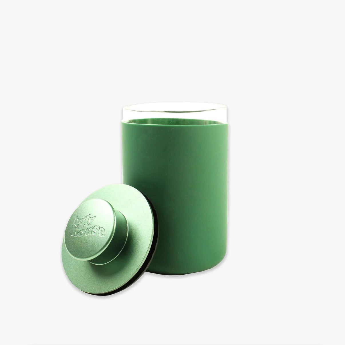 Stylish 9 oz Ugly House Stash Air airtight storage container in green, perfect for discreet herb and snack storage.