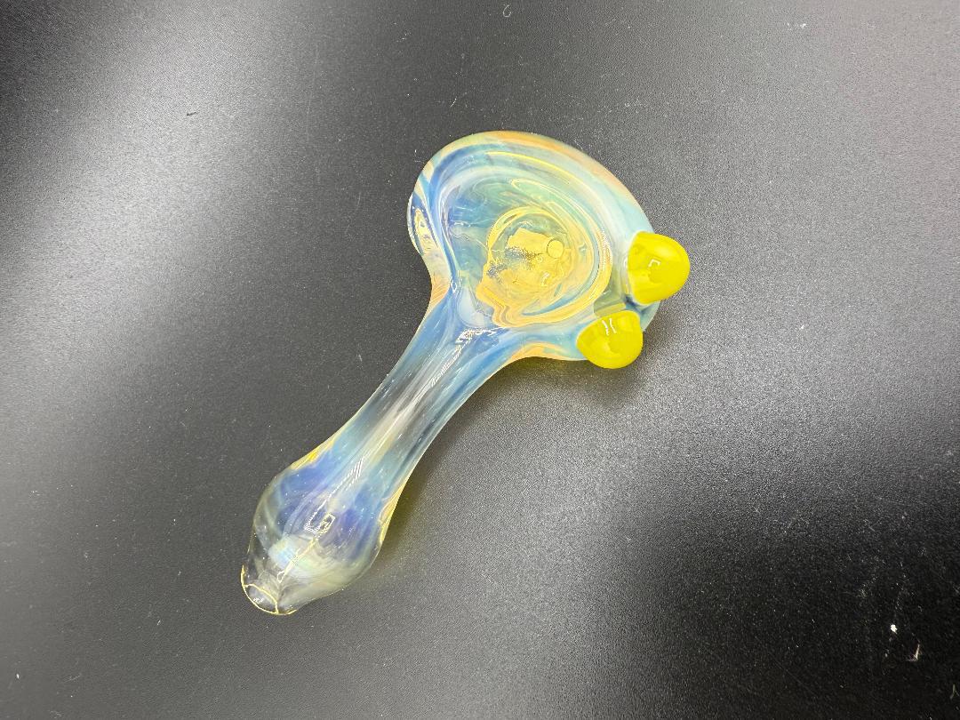 Elbow Tim Glass Fume pipe with color accents, handcrafted in Spokane, WA, showing a unique fumed finish.