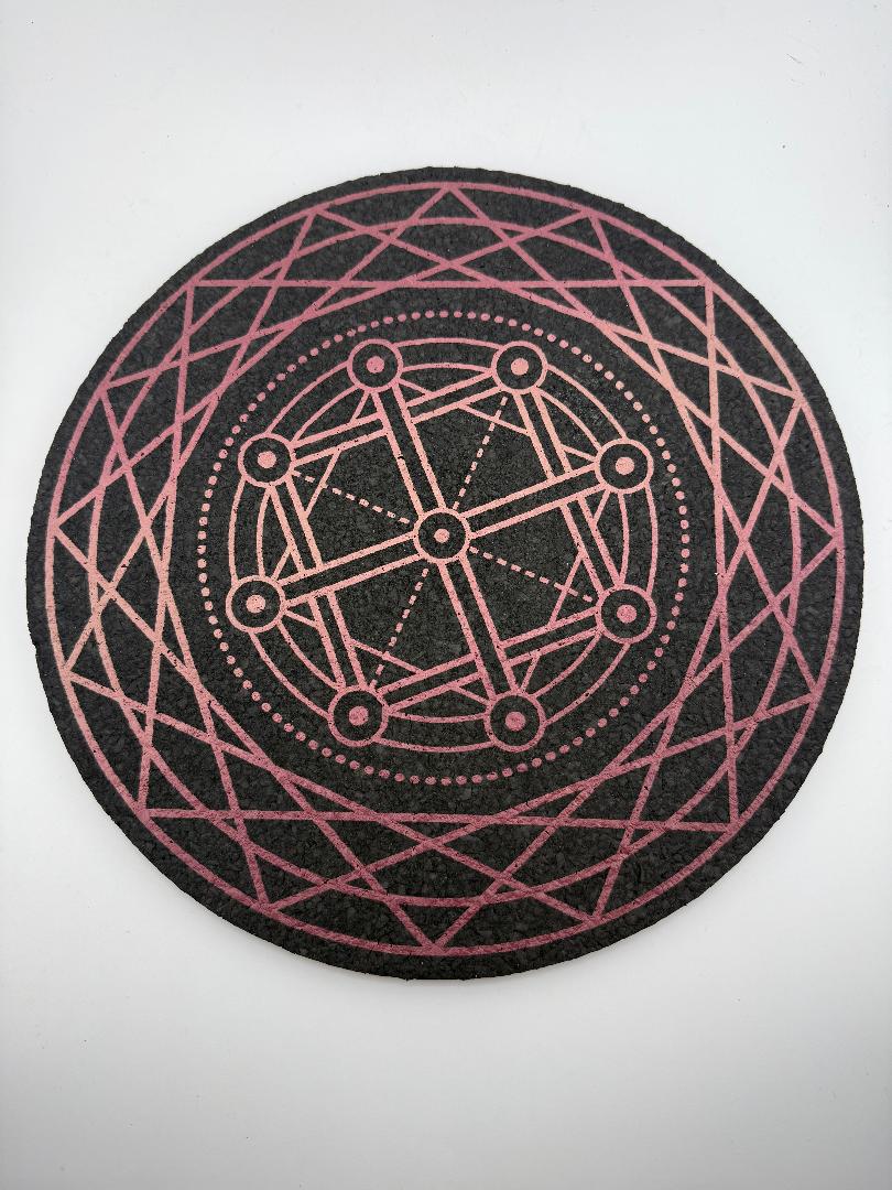 Haze Wheel - 12" UV-reactive foam mat with intricate geometric design for sustainable decor.
