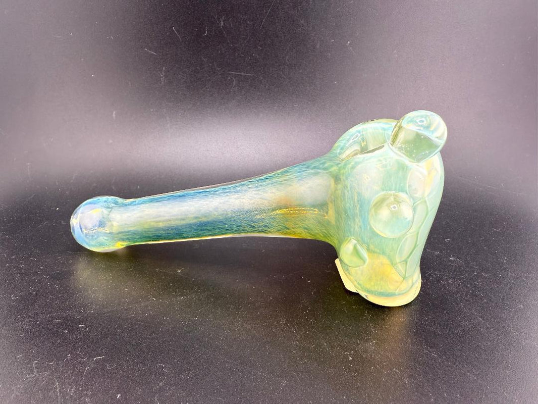 SBJ Honeycomb Tech Glass Pipe in vibrant green, showcasing intricate glasswork and smooth design for optimal airflow.