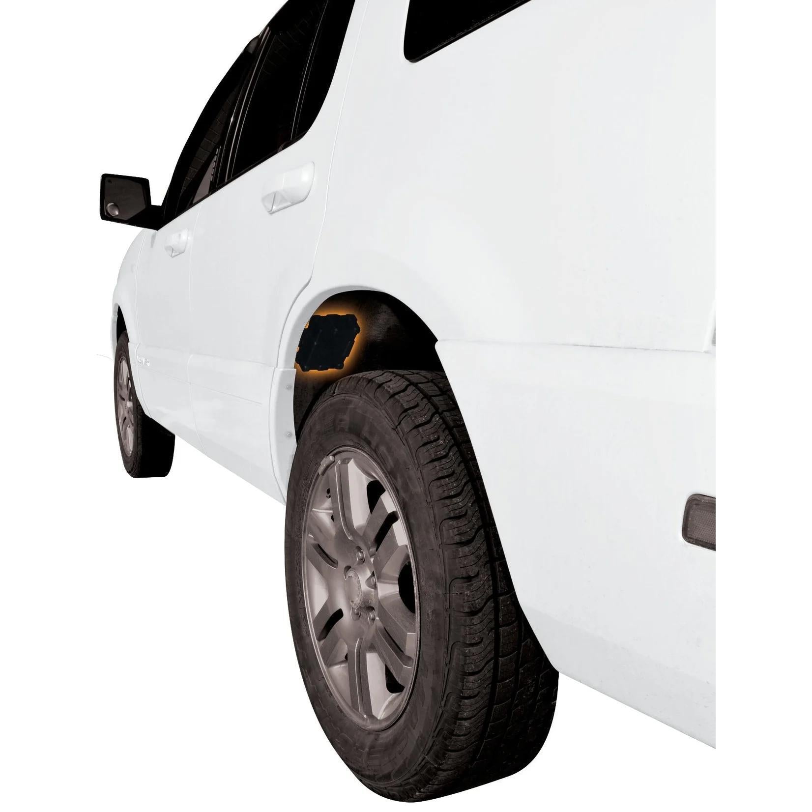 Roughneck Magnetic Locking Box securely attached to the side of a white SUV, demonstrating rugged design and functionality.