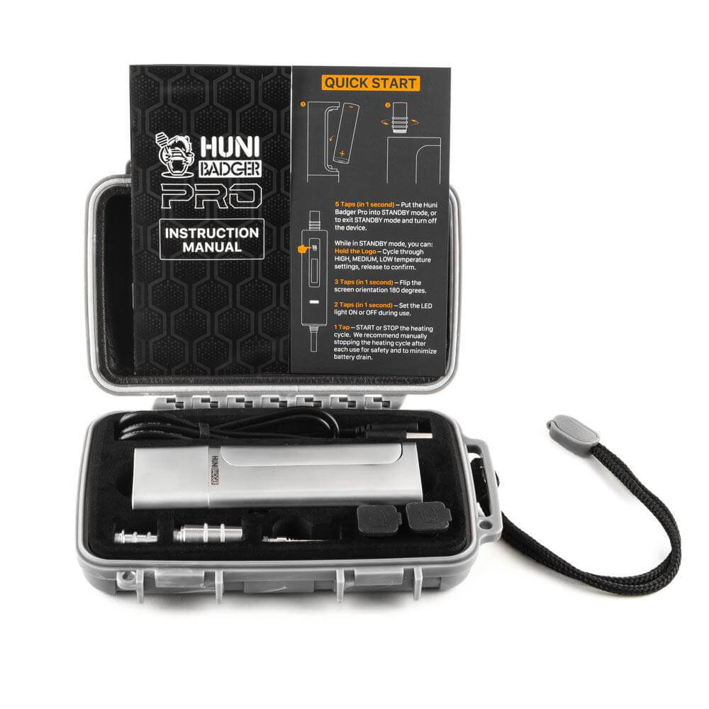 Huni Badger Pro portable device kit with instruction manual in protective case for herbal extracts.