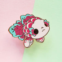 Evy Benita Enamel Pin - Flower Fish featuring whimsical fish design with floral accents on pastel background.