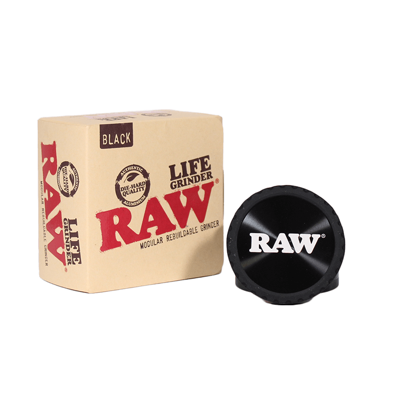 RAW Life Grinder with box, showing high-quality black modular design and branding for enhanced grinding experience.