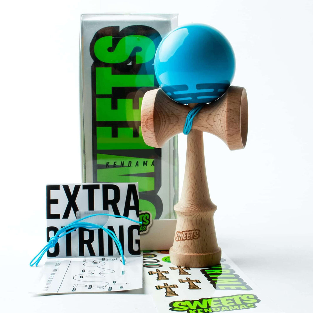 Sweets Kendama Radar Sticky Clear with blue tama, BOOST ken shape, extra string and stickers for kendama enthusiasts.