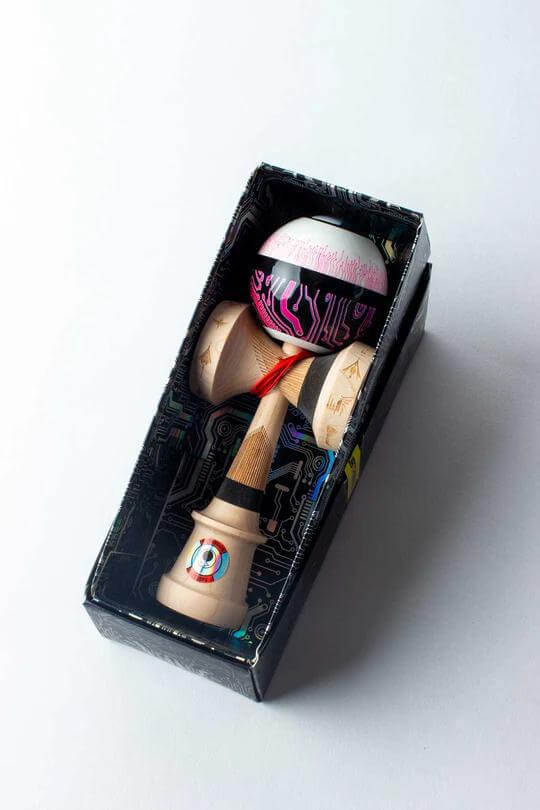 Sweets Kendama Subtronics V2 - Amped in box, featuring unique dark rings and high contrast design for enhanced playability.