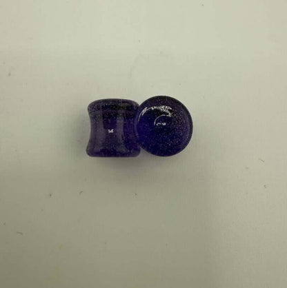Paulson Pieces 9mm ear plugs made from purple borosilicate glass, showcasing stylish body jewelry craftsmanship.
