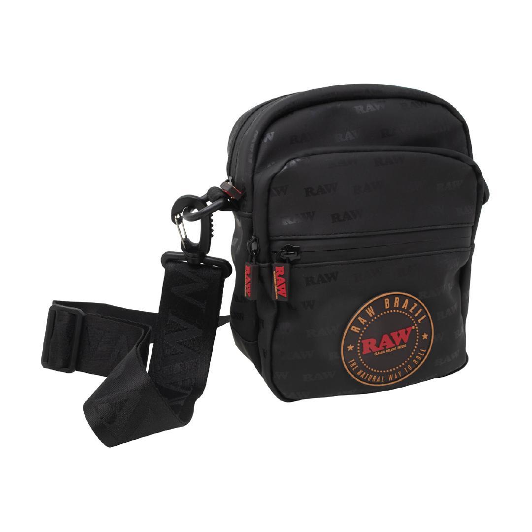 Raw Brazil Crossbody Bag with adjustable strap and multiple compartments for smokers on the go.