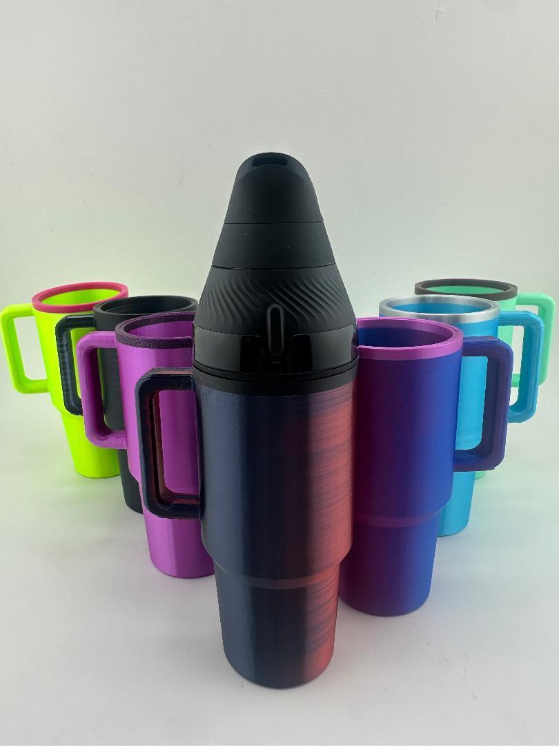3D printed Puffco Proxy Core mug collection featuring colorful designs and handles.