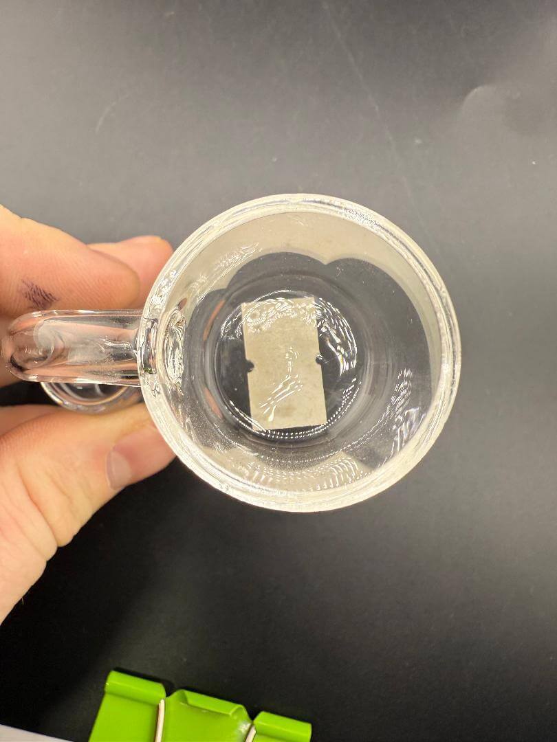 Import Quartz Banger - 18mm 90° Female Over Sized shown from above with internal quartz design and clear glass.