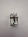 Clear glass jar with a silver lid, suitable for storing small items or concentrates.