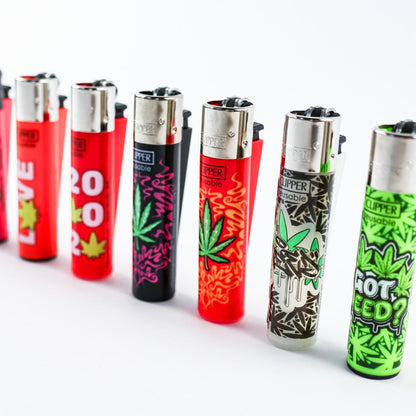 Clipper Lighter - Random designs lined up showcasing colorful styles and unique graphics.