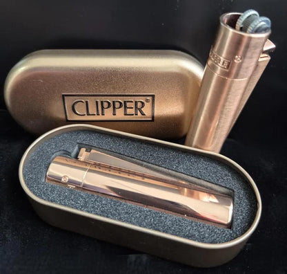 Clipper Metal Lighter Rose Gold in case, showcasing sleek rose gold design and refillable features.