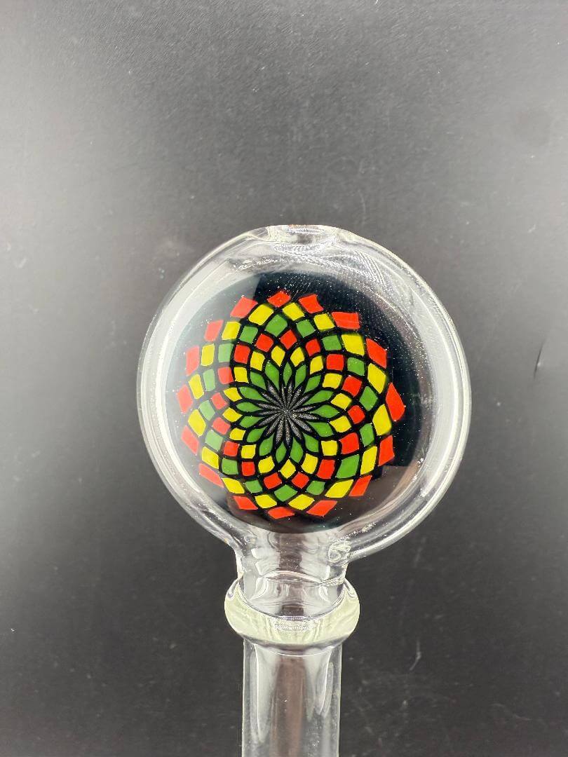 Filla John Glass Bubbler - Clear w/ Rasta Fillacello Mouth Piece 10mm with vibrant swirl design on mouthpiece.
