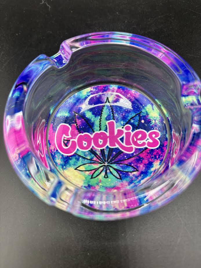 Cookies Glass Ashtray featuring vibrant colors and bold Cookies logo for smoking sessions.
