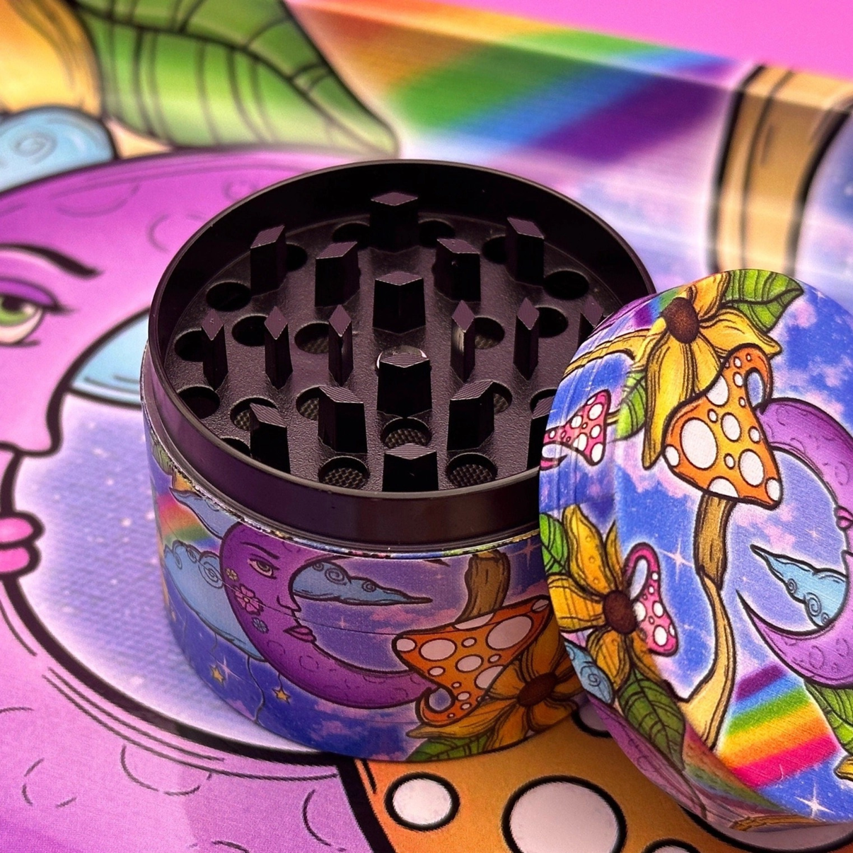 Coming Soon: Crescent Moon 2-Piece Herb Set – Rolling Tray & Grinder with colorful mushroom design.
