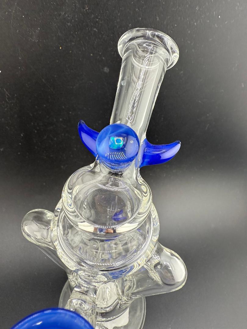 Crondo Clear Double Uptake Recycler with blue accents, showcasing heady glass craftsmanship and unique design.