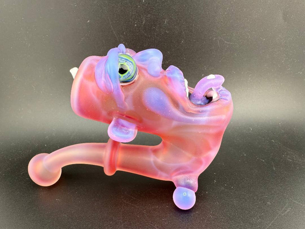 Crondo Face Pipe Sherlock in vibrant pink and blue glass design, featuring an artistic sherlock shape.
