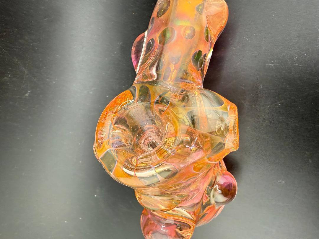 Crondo Glass Hammer Pipe - Heavy Fume featuring a unique design with vibrant colors and durable borosilicate glass.