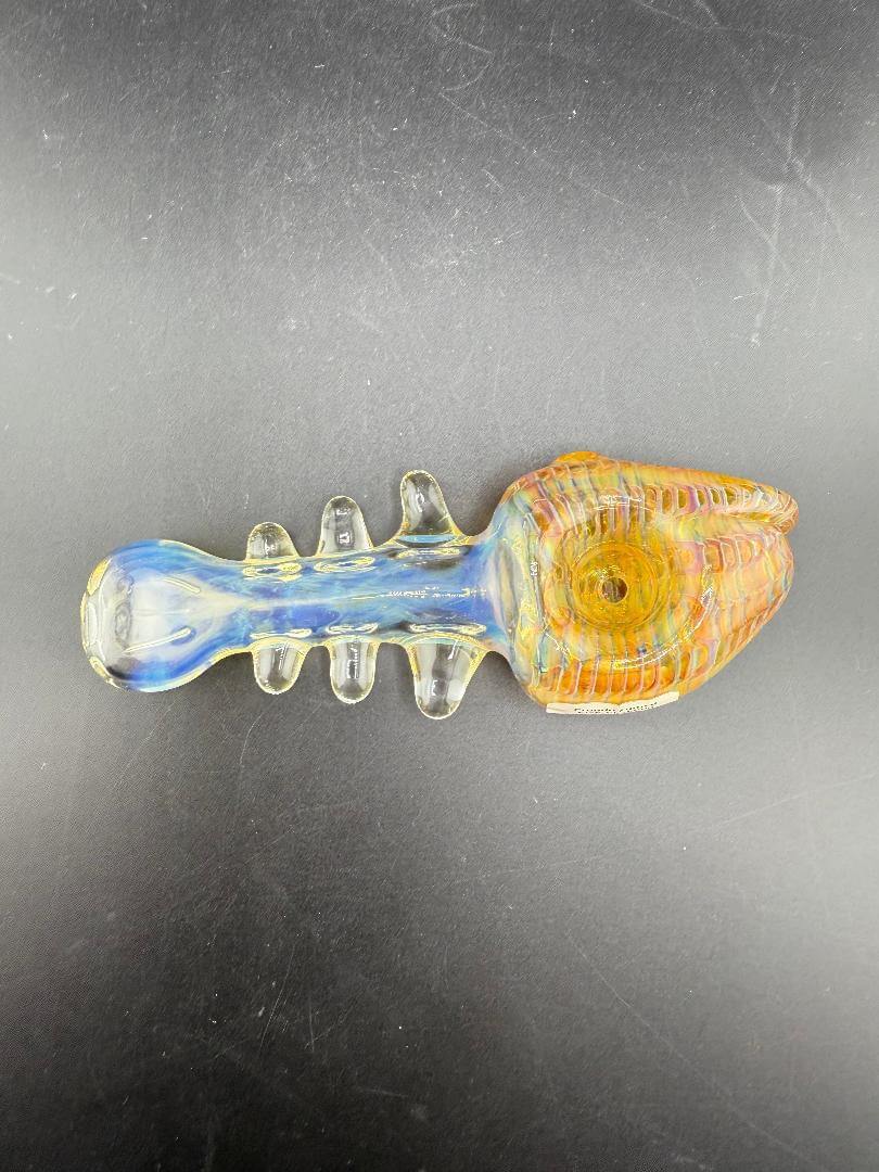 Crondo Glass Hand Pipe - Fumed Fish Skeleton showcasing a unique fish skeleton design in colorful glass.