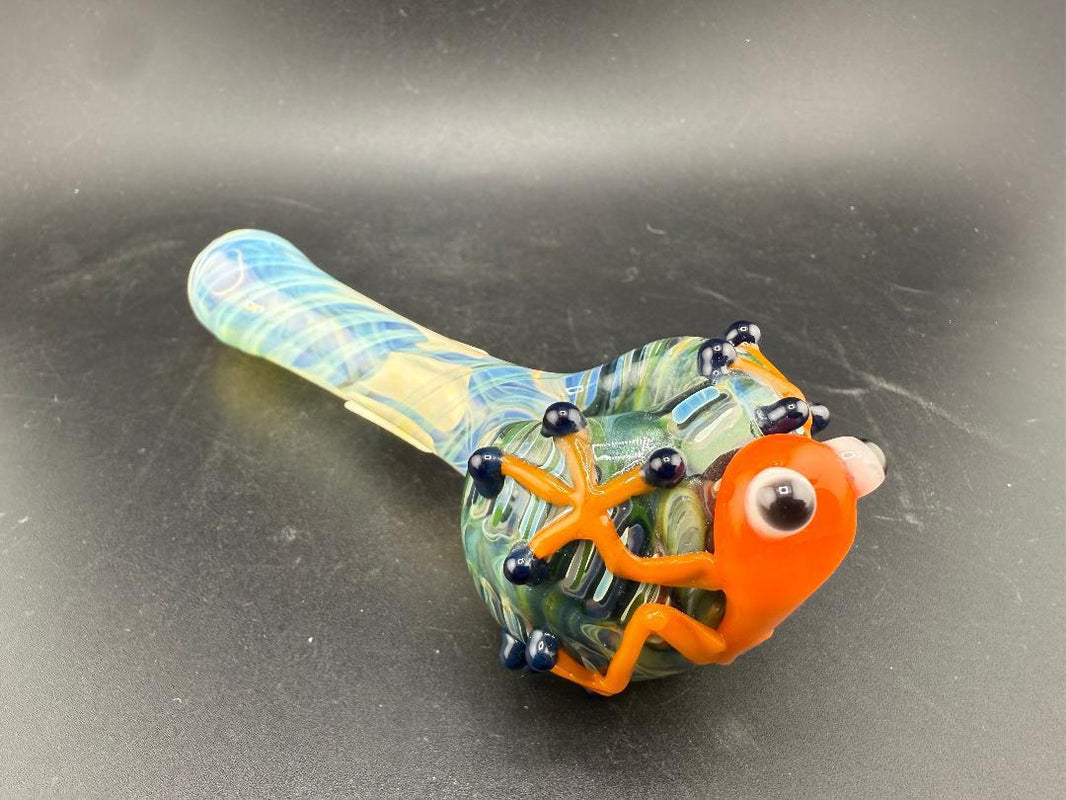 Crondo Glass Hand Pipe - Fumed w/ Sculpted Frog showcasing a colorful frog design with intricate details.