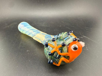 Crondo Glass Hand Pipe - Fumed w/ Sculpted Frog showcasing a colorful frog design with intricate details.