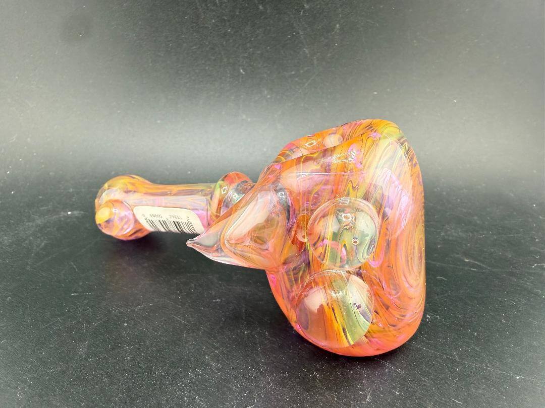 Crondo Glass Hand Pipe - Heavy Gold Fume showcasing vibrant colors and unique craftsmanship.