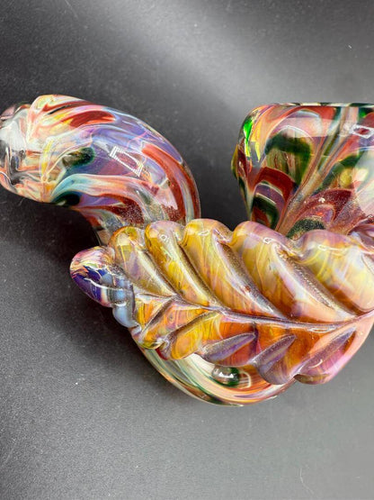 Crondo Glass Sherlock Pipe - Green, Amber & Red w/ Leaf Attachment Belt Buckle showcasing vibrant colors and leaf design.