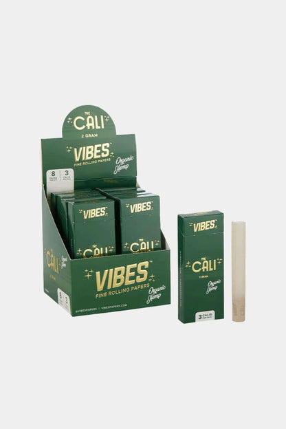 Vibes Cali 2g Cone display featuring boxes of Rice, Hemp, Organic Hemp pre-rolled cones in a vibrant green packaging.