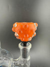 Close-up of a vibrant orange Hob Knob 14mm bowl with bubble accents, showcasing its unique design for smoking accessories.
