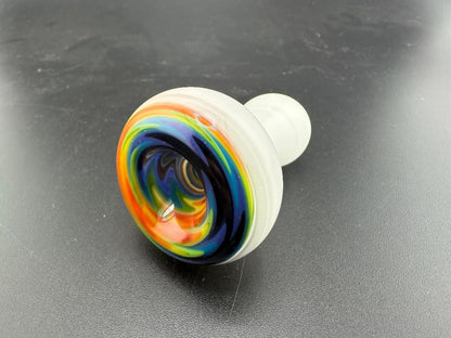 Colorful handcrafted Mcdoogle glass chillum, featuring vibrant swirling patterns, perfect for portable use.