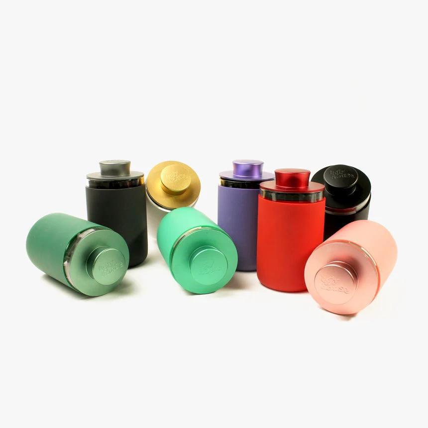 Colorful 9 oz Ugly House Stash Air containers in various styles for discreet storage.