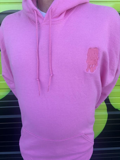 Nikk Drips Hoodie in vibrant pink color, showcasing high-quality cotton blend for warmth and comfort.