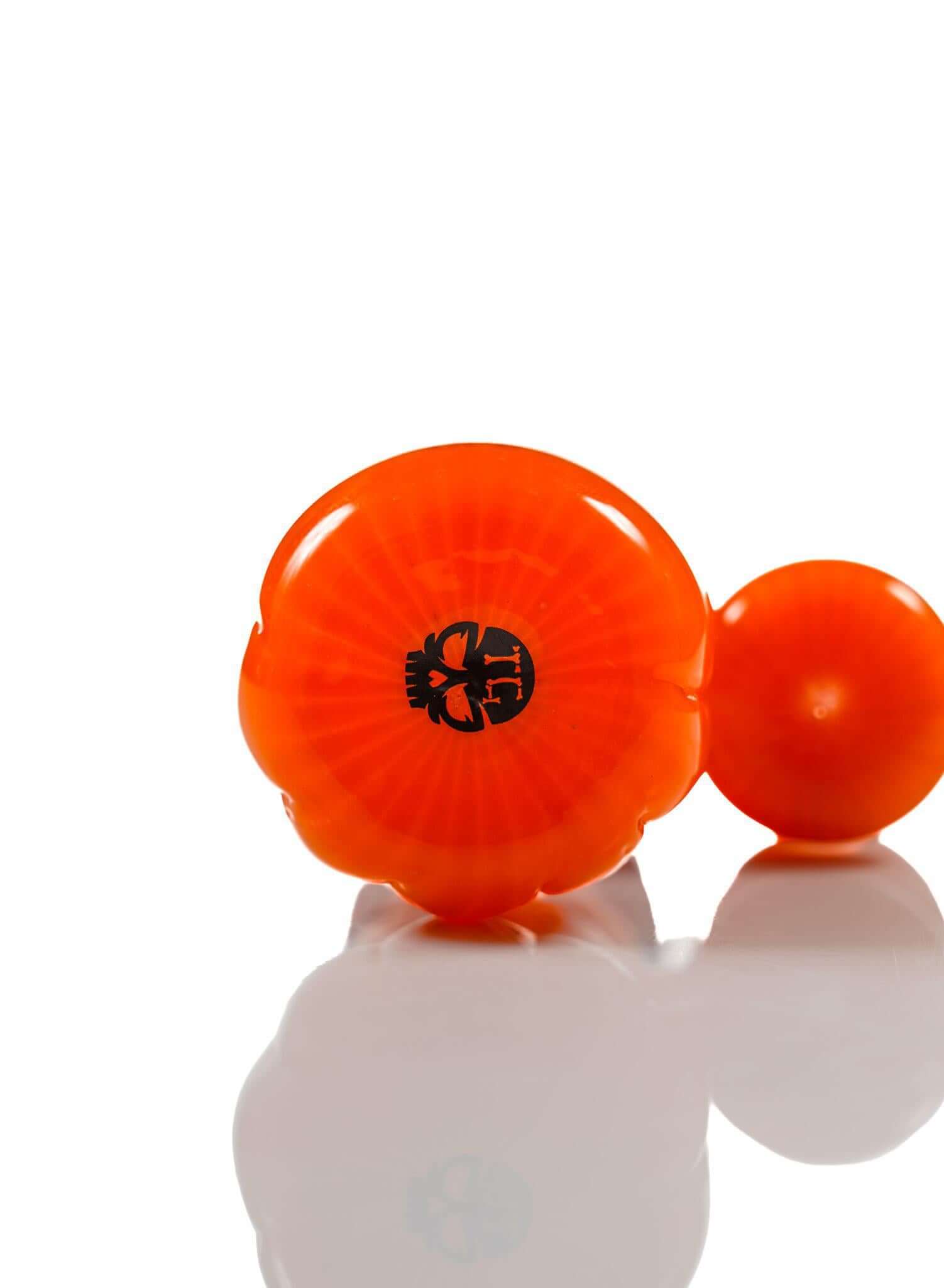 Toxic Pumpkin Bubbler TX104 in vibrant orange with skull design, perfect for Halloween-themed sessions.