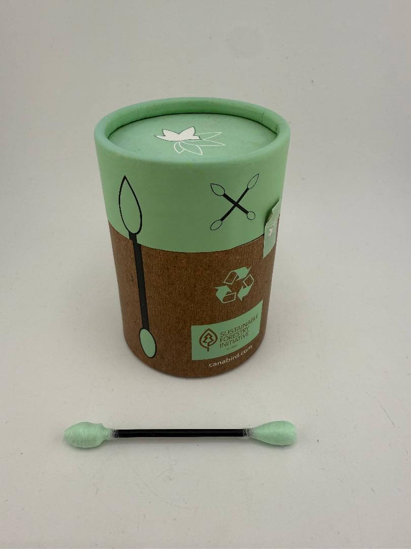 Stix biodegradable cotton swabs packaging with eco-friendly design and one cotton swab in front.
