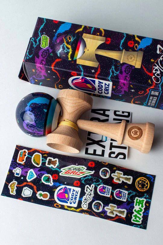Sweets Kendama CodyGriz Legend Cushion, brightly colored kendama with stickers and box design.