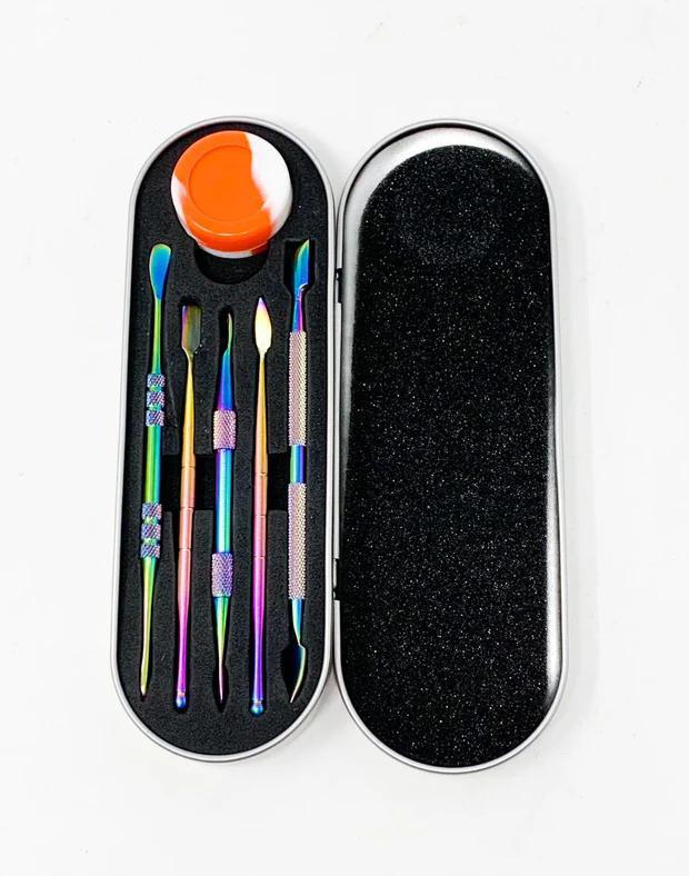 Dab Tool Travel Kit with 5 stainless steel tools and silicone slick container for concentrate handling.