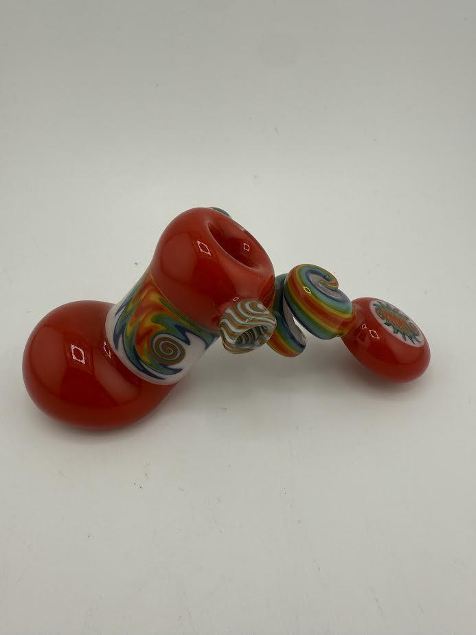 Mcdoogle Worked Hammer Red pipe with colorful design, showcasing intricate glasswork and vibrant colors.