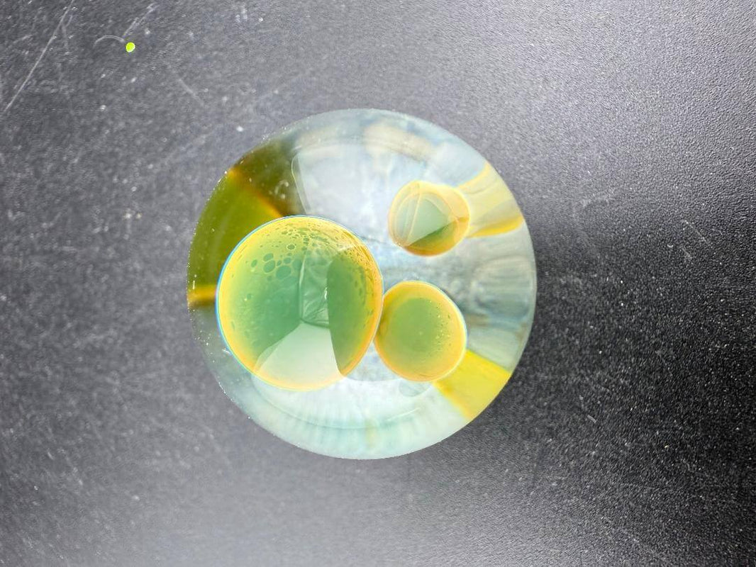 Danny W Glass Marble - 24mm Mushroom Implosion w/ Flat Bottom showcasing vibrant colors and intricate design.