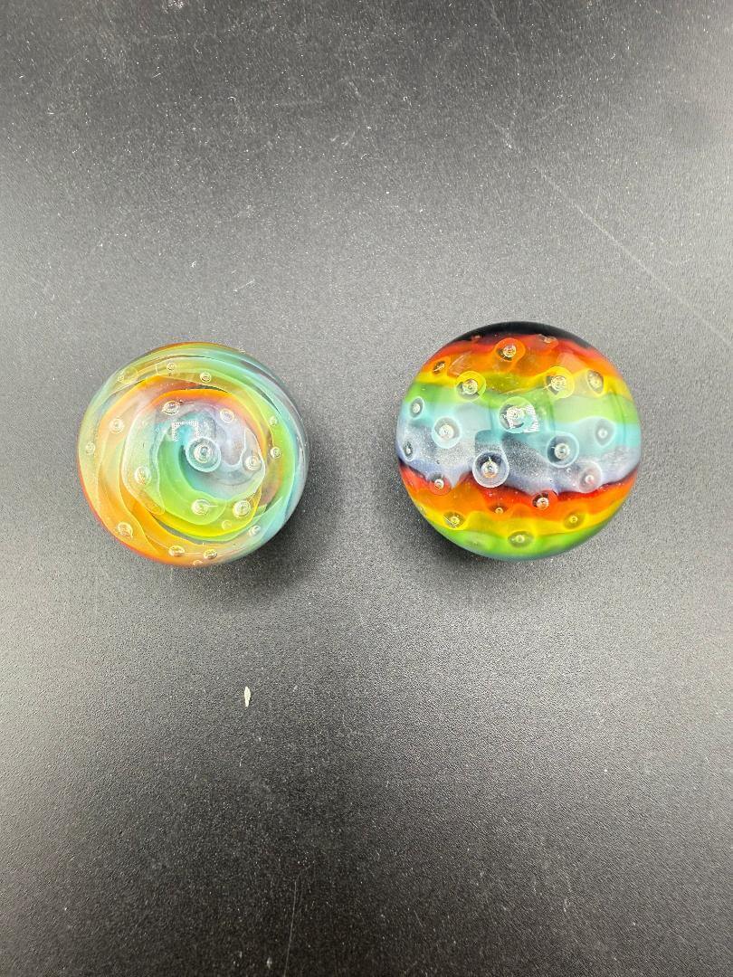 Danny W Glass Marble - 25mm Rainbow Bubble Trap showcasing vibrant colors and intricate design.