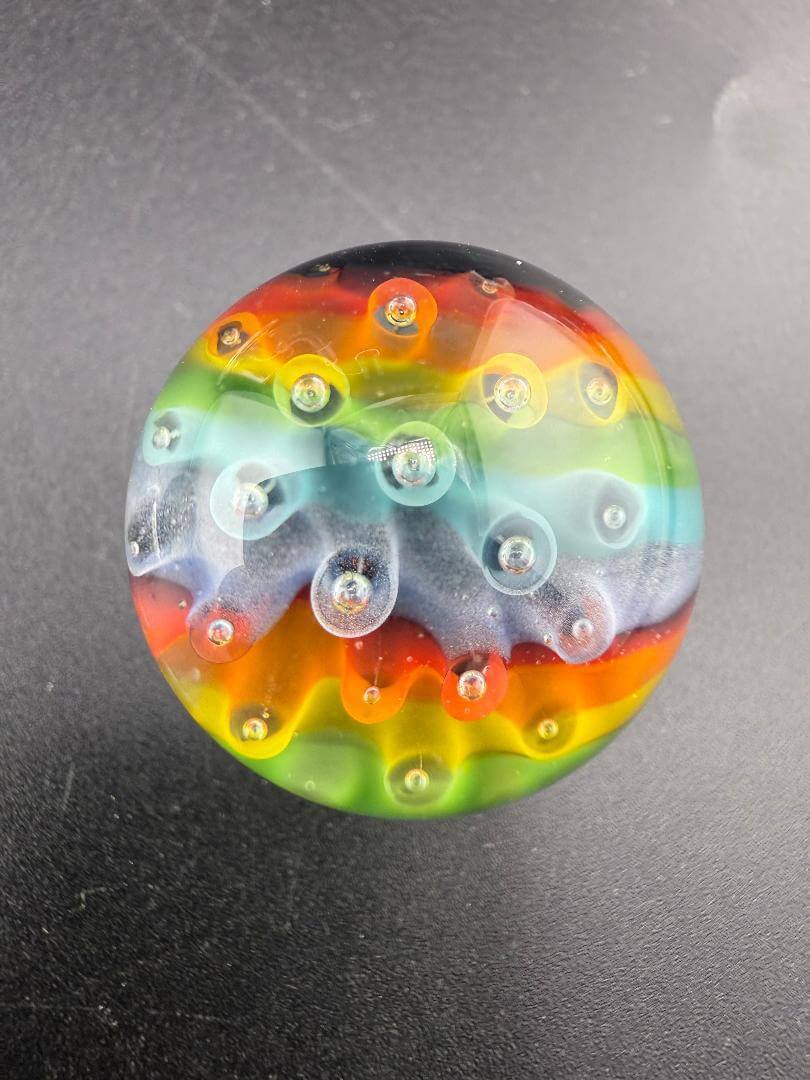 Danny W Glass Marble - 25mm Rainbow Bubble Trap showcasing vibrant colors and intricate design.